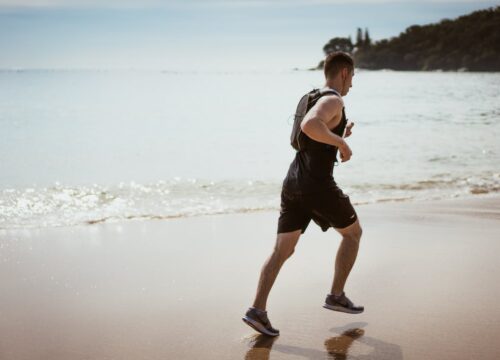 man running on beach